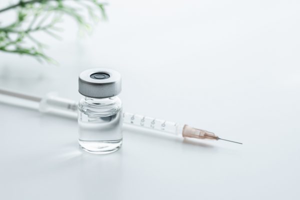 vaccine and syringe. Image of vaccination.