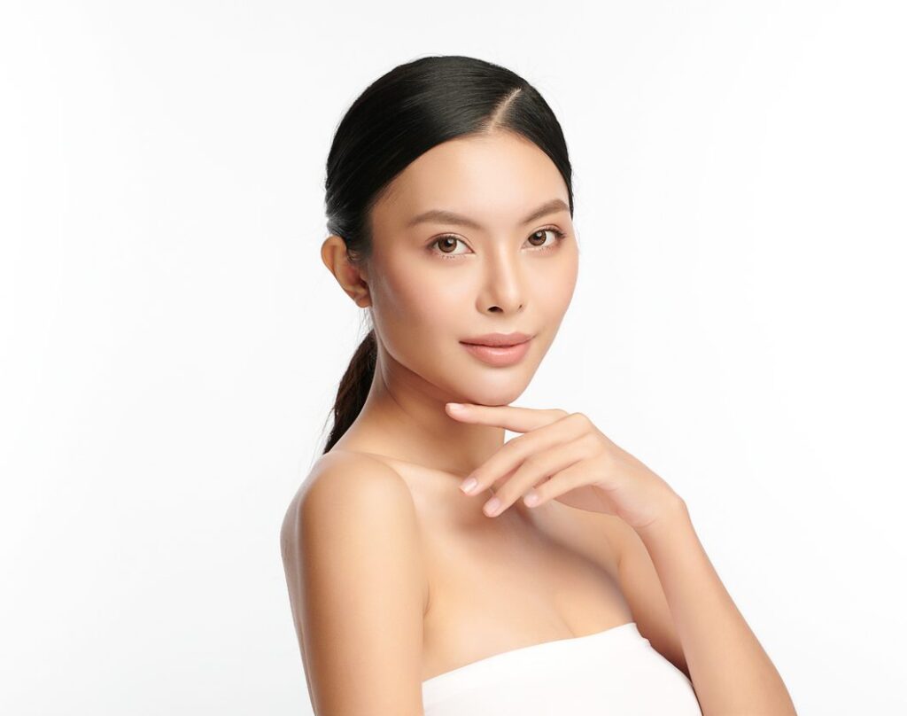 Beautiful young asian woman with clean fresh skin on white background, Face care, Facial treatment, Cosmetology, beauty and spa, Asian women portrait.