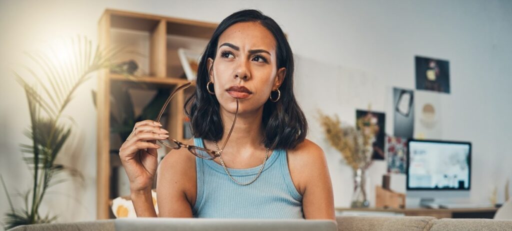 Beautiful mixed race woman thinking