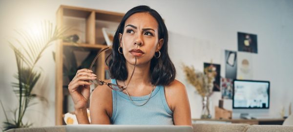 Beautiful mixed race woman thinking