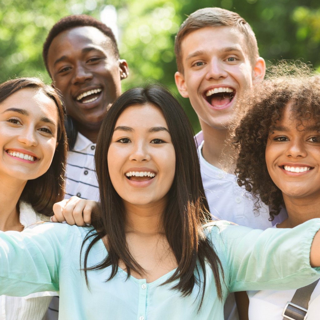 an image of a diverse group of men and women from multiple ethnic backgrounds, representing equality and inclusion