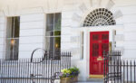 Photo of the 111 Harley St. red front door