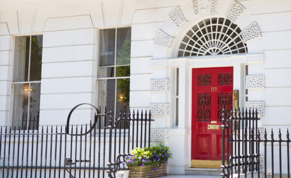 Photo of the 111 Harley St. red front door