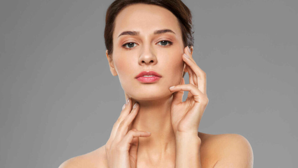 a Woman touching her face showing
