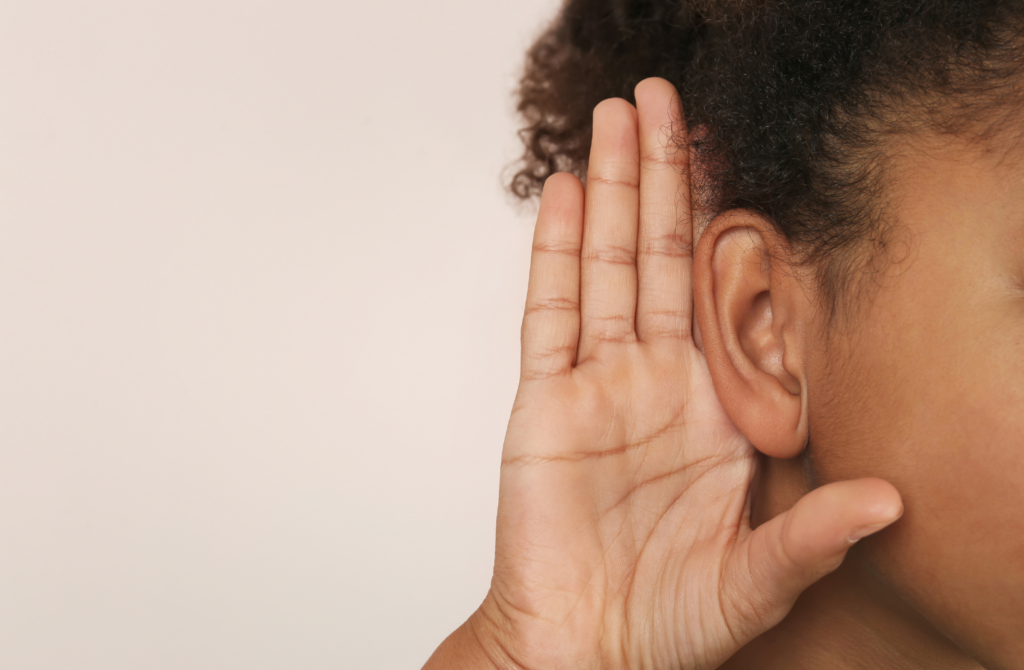 Detailed close-up of a person’s ear area